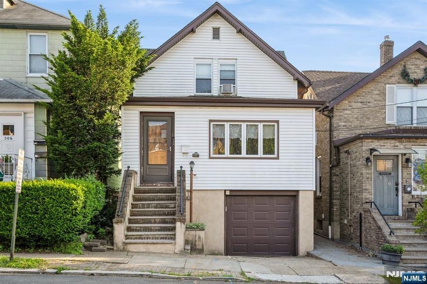 Fantastic opportunity to own in Ridgefield! Perfect for first-time buyers or savvy investors, this charming 3BR/2BA home is just steps from Bergen Blvd with easy NYC bus access, and close to GWB, schools, and houses of worship. The first floor features a living room, bedroom, full bath, and a eat in kitchen that leads to a backyard with a deck great for entertaining. Upstairs offers two bedrooms, a second full bath, and a versatile bonus room ideal for an office or lounge. Beautiful natural hardwood floors run throughout, preserving the home?s original charm. The unfinished basement provides great storage or expansion potential, and a one-car garage adds convenience. Bright, welcoming, and full of possibilities! Home is being sold as-is. Final Open House Thursday June 26th 5-8pm. Highest and Best is due on Friday, June 27th, by 2pm.