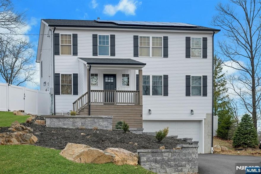 Stunning Custom-Built Home " Only 3 Years Young! This beautifully designed 5-bedroom, 2.5-bathroom home offers modern living with an open floor plan, hardwood flooring, and a fully finished basement. As you step inside, you're welcomed by an inviting open-concept layout perfect for entertaining and everyday comfort. The first level features a spacious dining area, kitchen w/granite top, and living room, highlighted by custom woodwork decor and abundant natural light. A walk-in pantry provides ample storage, while the first-floor bedroom, bathroom, and laundry room add convenience. Step outside through the side door to your private fenced yard ideal for outdoor gatherings, a pet run, or relaxation. Upstairs, you'll find four generously sized bedrooms, including a luxurious main suite with a spacious walk-in closet and an en-suite bath featuring a large walk-in shower and a double vanity customized design for maximum storage . The finished basement offers additional living space with a large entertainment room, a utility room, and access to the two-car garage. Solar panels installed in June 2023 for energy efficiency! Don't miss out on this incredible home schedule your showing today!