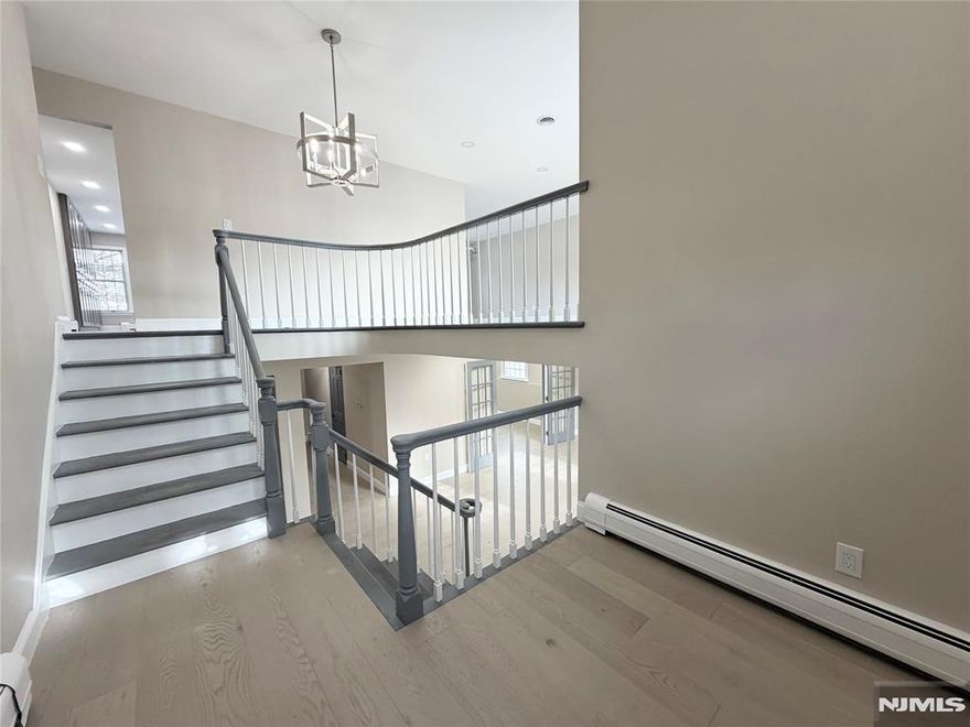 3300 sqft of elegant finishes in terms of high-quality materials and craftsmanship with 5 bedrooms and 3 bathrooms. Mirage Aspen hardwood floors; Fabuwood Onyx wood kitchen cabinets; Thor Kitchen appliances, headlined by 36" Gordon Ramsey chef edition gas range; Cambria countertop in kitchen and bathrooms; Bestar closet systems are just a few of the quality materials used throughout. Laundry also doubles as a summer kitchen. Additional features include: Elevator, back-up generator, central heating & cooling, central vacuum, wood fireplace, 3-car garage. Fenced-in backyard. Huge/modern kitchen; luxurious master suite with spacious master bathroom and walk-in closet. Listing Agent is partial owner of the property.