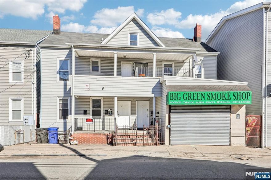 Massive Investment Opportunity in Paterson! Discover this unique, oversized property at 106-108 East Main Street, offering an incredible footprint and versatile income streams. This side-by-side two-family home features two spacious residential units, each boasting 3 generous bedrooms and 2 full bathrooms. Adding to the value is a prime street-front commercial space, perfect for a small boutique, office, or local business, providing immediate rental potential. The property sits on a rare, oversized lot, offering expansive outdoor space that is hard to find in this area. Investors will also appreciate the full basement, which provides significant additional flex space for storage, workshops, or hobby areas. Whether you are looking for a multi-generational home or a high-yield addition to your portfolio, the sheer scale and variety of rental options here make this a standout choice. Don't miss out on this high-potential generator!