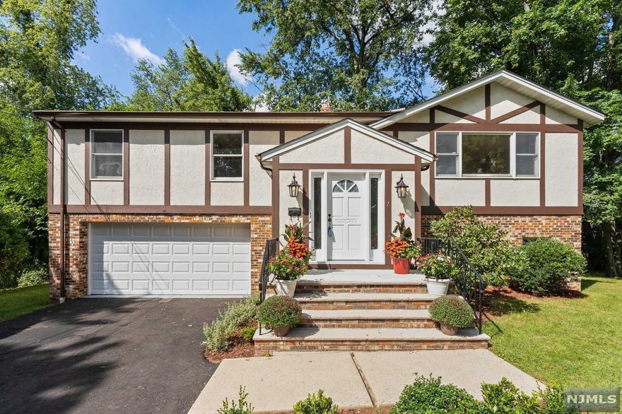 Introducing this newly renovated split level home located on a quiet cul-de-sac. As you enter and go into the ground level you will be greeted by the grand 9ft ceilings and massive family room which gives you access to the backyard, laundry room, garage, and half bath. The 2nd level offers hardwood floors throughout along with a stunning new kitchen, quartz countertops, and stainless steel appliances. The spacious master bedroom has a walk in closet and newly renovated bathroom with standup shower. This truly is not one to be missed