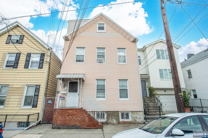 Estate Sale, strickly sold "As Is" Great opportunity to live in the desirable Ironbound Section of Newark & own this income producing property in a fantastic neighborhood! Live in one and rent out the two other apartments. First floor has three large bedrooms, glistening hardwood floors, large bathroom with cabinets & storage, eat in kitchen with plenty of cabinets, gas stove, natural lighting, enclosed porch, full basement & large backyard; second floor is rented month-to-month to nice tenants; third floor is a one bedroom apartment, open floor plan. OPEN HOUSE THURSDAY, OCT. 3RD 12-2!