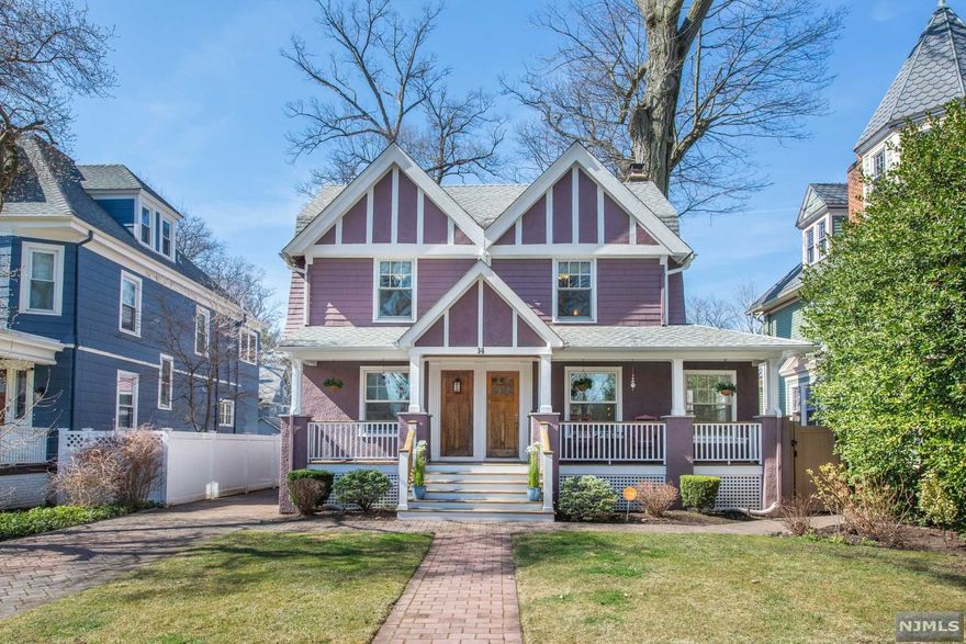 Expanded 5-BR, 3.1-BTH Craftsman Colonial w 2-story addition, natural woodwork, period accents, spacious rooms, CAC, HW flrs, newer Pella windows, easy access to transport & more! Mahogany front porch w recessed lights. Large LR w crown moldings, closet & brick FP. French door leads to den. Formal DR w Tiffany-style ceiling lamp. EIK w SS appls, custom cabinets, recessed lights & granite counters. 1st fl addition blends w original home & is reached thru pocket doors to bright family rm w crown moldings, ceiling fan, powder rm, pantry & access to back patio. 2nd fl has 4 BRs, ceiling fans & full bath w pedestal sink & linen closet. Primary BR in addition has tray ceiling, recessed lighting, Tiffany-style lighting, 2 closets & ensuite bath w pedestal sink, tub/shower. 3rd flr has office, builtins & 5th large BR! Fin basement has play, storage, utility, laundry rooms & full bath. Backyard w paver patio, fence, 1-car garage. 0.6 mi to NY train & bus, Bloomfield Ave shops/restaurants.