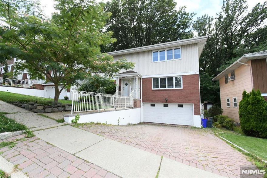 First floor in a 2-Family home fully renovated offering 2 bedrooms, open concept kitchen and dining area leading out to a large deck overlooking fenced in backyard. Ground floor is ideal for family room, home office, guest room, or play area leading to garage and walkout to backyard. Beautiful hardwood floors throughout the home plus In-home laundry for added convenience. 1-car garage plus 1 car additional driveway parking. Located on a quiet, tree-lined residential street Ridgefield offers outstanding parks, playgrounds, and a seasonal community pool. Close to restaurants, shopping, schools, highways. Easy NYC Commute: Convenient Express Bus to NYC. Please no pets.