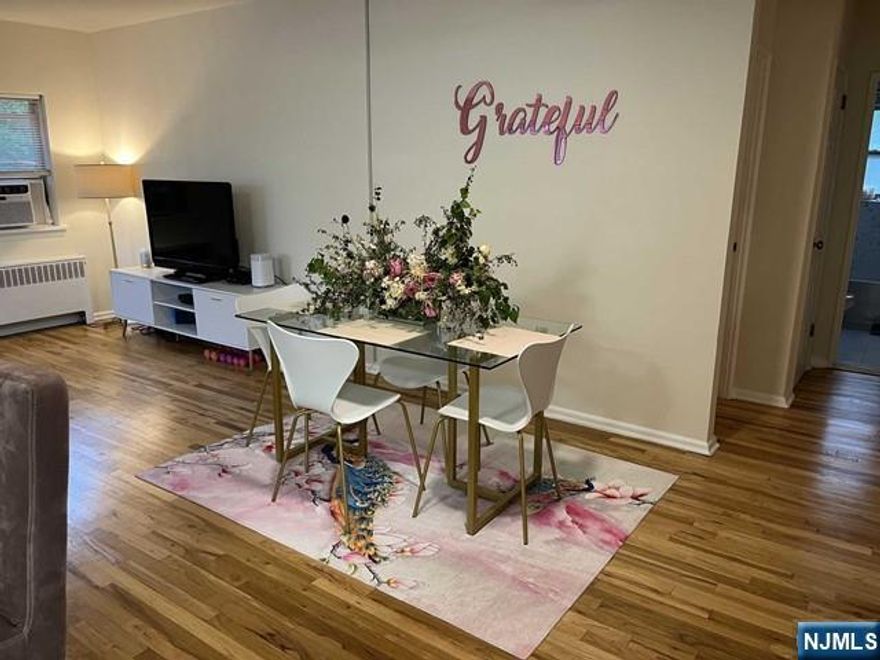 1ST FLOOR... RARE FIND in Prestigious RIDGEWOOD "OAK MANOR" ! OPEN FLOOR PLAN. LARGE 2 BEDROOM is Available IMMEDIATELY... Cheerfully Bright with Natural Sunlight......Granite Kitchen Counters Eat In Spacious Kitchen with "Gas "Range- Includes Newer Appliances, Dishwasher, Refrigerator. Hardwood Floors throughout!. Large Closets. Storage Unit may be available; Bicycle Rack Room ! Washer & Dryer In-Suite (Hard to find)! High Speed Internet, Cable Ready. Entertainment Deck and BBQ Area and Newer Fitness Center. Also included is Parking ON SITE... Garage and Extra parking Space is optional. Close to Train, Bus and Village amenities. Excellent Schools! On-Site SUPER ! PETS CONDITIONAL --LIMITED TIME ONLY: SHORT TERM 3 MONTHS OR MORE! Photos are similar.