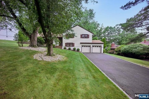 Photo of 19 Bear Brook Lane, Livingston, NJ 07039 (MLS # 26023874)