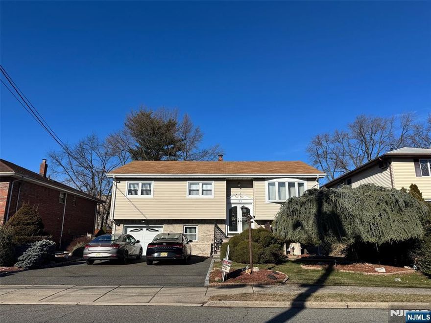 Exceptional Bi-Level with Dual-Living Potential in Heart of Little Ferry! Welcome to this uniquely spacious bi-level home, will be freshly painted and HW floors refinished.. fully move-in ready. Designed with an expansive layout, this property is perfect for multi-generational living or those seeking an oversized home office. The interior features 3 bedrooms and 3 full bathrooms, along with a rare configuration of two full kitchens and extra range area, two sun-drenched living rooms, and two formal dining areas.. Enjoy the convenience of a dedicated laundry area and a private office space. Outside, the large backyard is an entertainer's dream, featuring a patio and storage shed. With a 1-car garage plus 2-4 additional driveway spaces. walking distance to the bus station to NY, close to all major highways, with easy access to shopping centers, restaurants, and more.