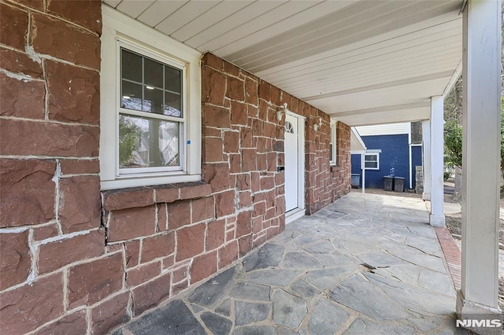 Photo of 1087 Lambert Road, Teaneck, NJ 07666 (MLS # 26008820)