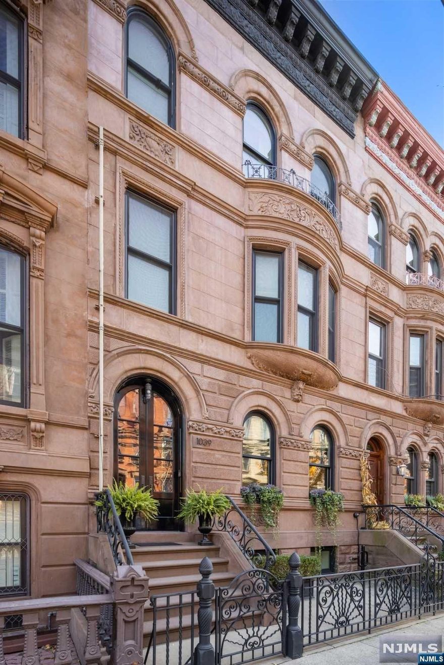 1039 Bloomfield Street is one of Hoboken's most exceptional brownstones. A rare 23.5 wide townhome which has been completely gut renovated and redesigned through the collaborative efforts of award-winning architect Mowery Marsh Architects and J Laurie Designs. This 5 bedroom, 5.5 bathroom home is located on one of uptown Hoboken's most coveted tree-lined streets. The architect and designer have retained all the wonderful aspects of historic brownstone architecture and incorporated a stunning design and layout that will enthrall even the most sophisticated townhome buyer. Starting with the handsome and intricate historic brownstone fa ade with second floor bay window, no detail has been overlooked in the nearly two year renovation of this stunning home. Entering the parlor floor you are immediately struck by the width and proportions of the home as well as the gracefully restored original newel post and staircase. The formal living area is anchored by a lovely gas fireplace...