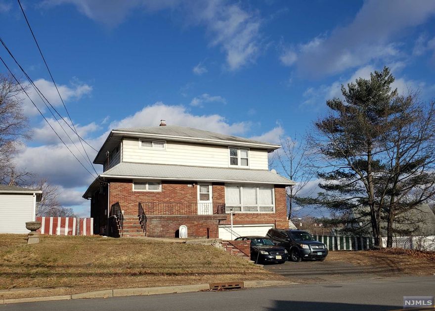 A rare opportunity to own one or possibly two multi family homes located right next door to each other...a great find for all Investors or owner occupants...Live in one unit and collect rent from the other. This multi family offers a total of 5 bedrooms & 3 full baths, a full finished basement and a 2 car garage . The 1st floor has 3 bedrooms, 2 full baths, laundry, a large living room, EIK and a full finished basement, while the 2nd floor offers 2 bedrooms, a full bath and a good size EIK and LR. There are wood floors on both levels, NEWER windows on the 2nd floor, baseboard heat and all public utilities. The 1st floor unit has good size rooms but is in need of updating and repairs. House is being sold strictly "AS IS"! 500 W Broadway is also for sale...see MLS #