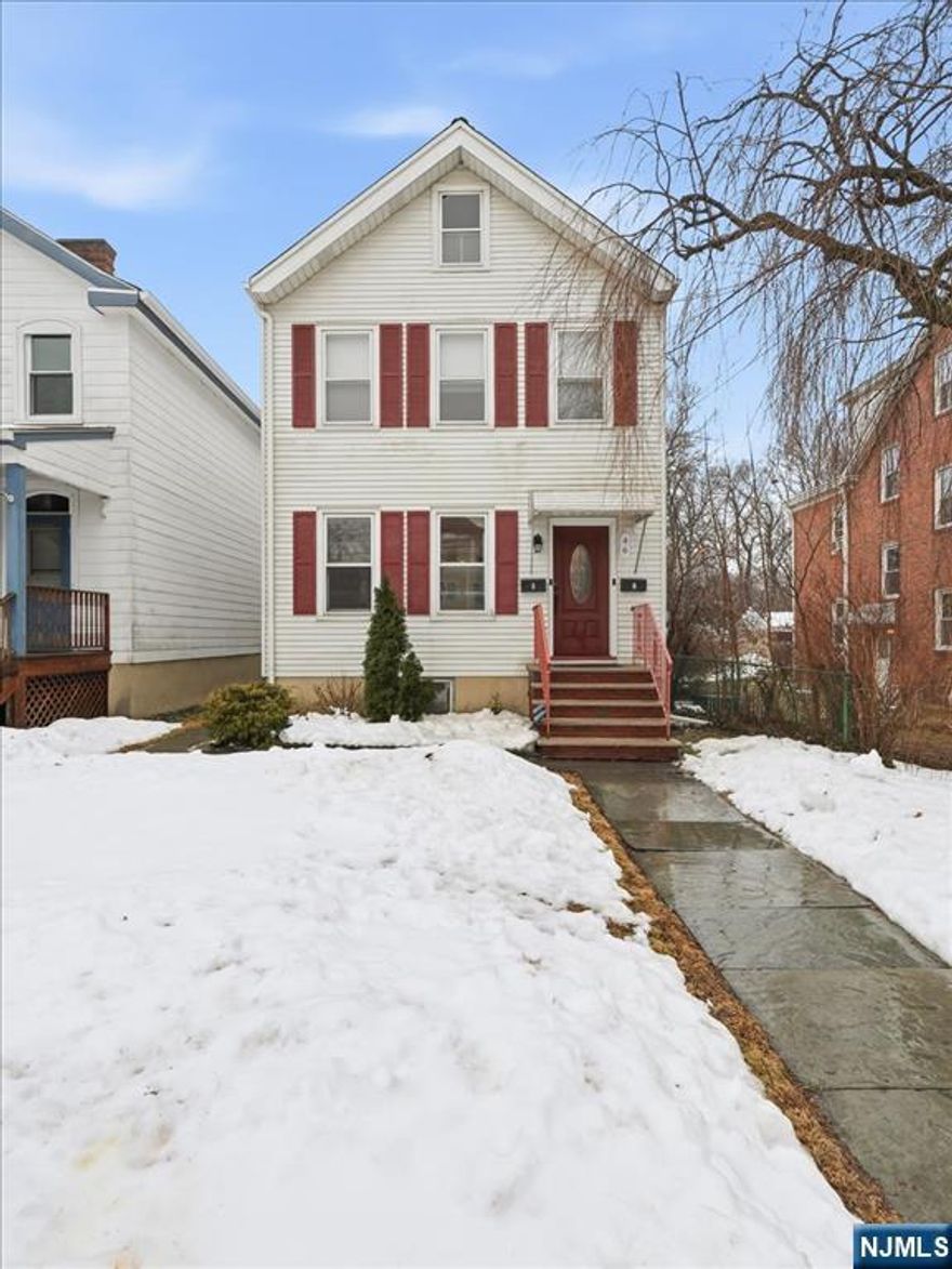An extraordinary opportunity for investors, owner-occupants or first-time landlords awaits at 46 Maple Street. This exceptionally well-maintained two-family property is in a quiet residential neighborhood just minutes from Bloomfield's downtown, steps from Foley Field (tennis, track, ballfields, skatepark), and offers an easy commute to NYC by train or bus. The property also backs up to the future urban park that will connect several northern NJ towns including Bloomfield.This property has a total of 3 bedrooms and 2 baths. The move-in-ready first-floor one-bedroom apartment is vacant. It features a large living room and separate dining room with refinished hardwood floors, a modern bath, and an upgraded kitchen with quartz countertops and stainless-steel appliances. A sunny mudroom leads to the shared backyard.The second-floor, 2-bedroom unit is leased through early 2028. It features a spacious primary bedroom with French doors, a second bedroom, a modern bath, and a kitchen with granite countertops and stainless-steel appliances. Steps from the rear mudroom lead to the shared backyard.A rarity in Bloomfield, the property boasts a large, fenced-in backyard with a deck, grill, outdoor furniture, and shed. In the basement there are storage closets, a laundry area, and a workshop.Whether expanding your portfolio, looking for steady rental income, or wanting a live-in-one/rent-the-other arrangement, this Bloomfield gem is not to be missed!