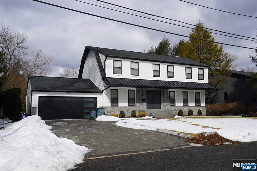 4 BEDROOMS, 3.5 BATHS LOCATED ON ONE OF THE MOST BEAUTIFUL STREETS OF CRESSKILL. THIS BRIGHTLY LIT HOME FEATURES LIVING ROOM, DINNING ROOM,LARGE FAMILY ROOM WITH FIREPLACE. OPENS TO A MODERN EAT-IN KITCHEN WITH GRANITE COUNTERTOPS AND STAINLESS STEEL APPLIANCES. 3 ROOMY BEDROOMS, FULL BATH, PLUS LARGE MASTER BEDROOM SUITE. BEAUTIFUL REFINISHED HARDWOOD FLOORS THROUGHOUT. FULL FINISHED BASEMENT, BONUS ROOM, FULL BATH AND LAUNDRY. LARGE NEW COMPOSITE DECK OVERLOOKING A LUSH BACKYARD. THIS BEAUTIFUL PROERTY IS RECENTLY RENOVATED. THERE IS A GAS STOVE AND AN INDUCTION IS ON THE CENTER ISLAND. TWO REFRIGERATIORS AND TWO LAUNDRIES. LARGE TV ON THE WALL IN FAMILRY ROOM ADJACENT TO KITCHEN WILL STAY. SNOW REMOVAL BY THE TENANT. LAWN CARE BY THE LANDLORD. MUST SEE.