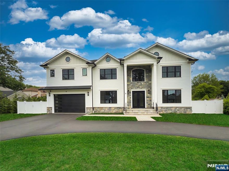 This New Construction luxury home, built with a new foundation, totals approximately 6,700sqft when including the fully-finished basement and garage. This home has six bedrooms, each with a full bath and five of them have at least one walk-in closet. The primary bedroom has a spa-like ensuite, tray ceilings, and two large walk-ins closets. Upon entry, a dramatic 2-story foyer flows well to each room on the main level. The first-floor features 10ft ceilings, 8ft doors, 2-story family room, a formal dining room, powder room, a large bedroom with ensuite and walk-in closet, a versatile bonus room/office, and separate wet and dry bars. The high-end kitchen includes a massive center island, custom cabinetry, and walk-in pantry. Upstairs you will find 9ft ceilings, four generously sized bedrooms, a laundry room, and a balcony overlooking the family room. The fully-finished 2,000sqft basement adds more living space with a large rec room, media room, a bedroom with a nearby full bath and nice double door closet, summer kitchen, bonus room and 9ft ceilings. Set on a nearly 100 x 200 lot, the home includes a circular driveway, gated fence, and large backyard. Additional features: custom hardwood floors, stylish millwork, generator hook-up, and smart garage. Close to top schools, highways, shopping, and bus or train access. Newly built homes of this size and quality on a large flat lot are a rare find. 10-year warranty.