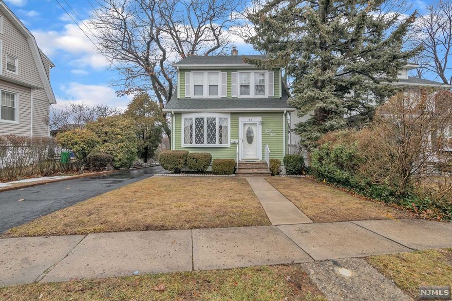 3 bedroom, 1.5 bath Colonial located 30 minutes from NYC. Oversized property with lots of potential for expansion and great curb appeal. Spacious light filled rooms with parquet floors under carpet on first floor and hardwood under carpet on 2nd floor. Central Air and heat is gas steam radiators. Full partially finished basement with family room, laundry room and half bath. Lots of off street parking. Convenient location close to schools, shopping & entertainment, parks, restaurants. EZ access major highways, NYC bus, short drive to park & ride or train.