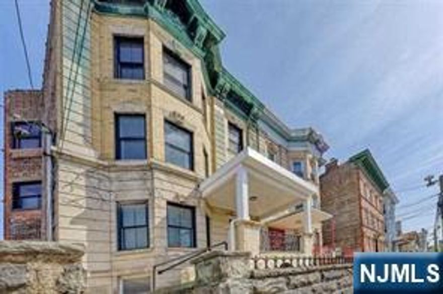 Beautifully Renovated Unit! 4 bedrooms, 2 full custom bathrooms, on the second floor! A commuter's dream! Conveniently located minutes from NYC, public transportation, PATH train, Shops and Restaurants. This sun filled unit features an open floor plan perfect for entertaining guests in the large living room/ kitchen combo. Unit boasts approximately 10 ft ceilings, newer gleaming oak hardwood floors throughout, custom white kitchen cabinets with leathered granite peninsula, stainless steel appliances, in unit washer/dryer and so much more! Water, Landscaping and Snow Removal are all included! A must see!!