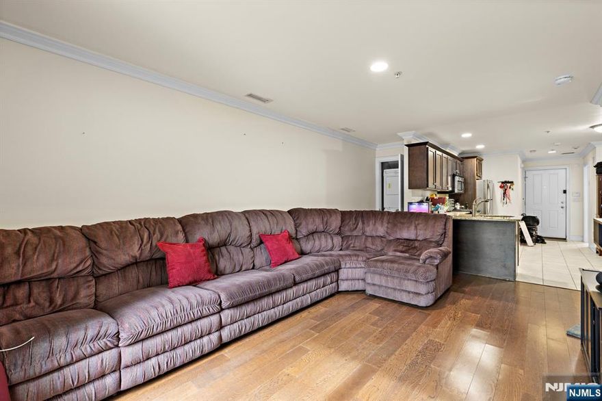 Welcome to this gorgeous 2BR/1BTH condo in the GREEN community (cheap utilities) with NYC bus stop directly outside the entrance. Featuring a spacious living room, modern kitchen, and ample natural light throughout. Perfectly situated close to public transportation, schools, and parksâ€”ideal for commuters and families alike. Enjoy a well-maintained building with easy access to local shopping, dining, and amenities. 2 deeded parking space. Donâ€™t miss this excellent opportunity to own or invest in a great area! Call/Text Michael 201-240-8422 for a private showing.