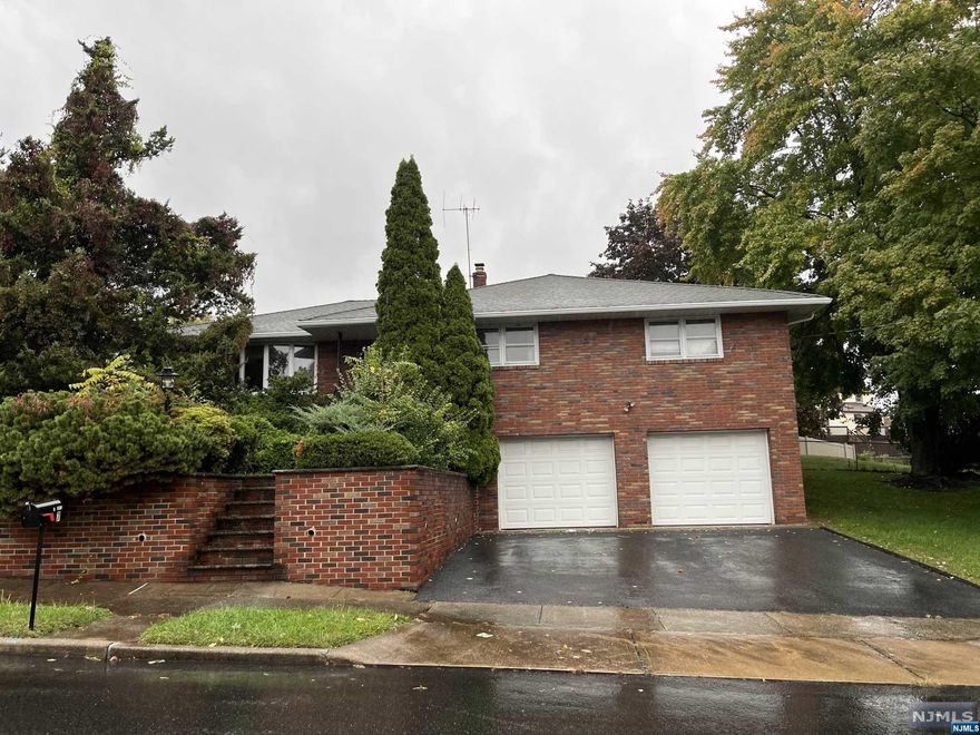 Ranch located on corner lot in great area of Totowa. This home features 3 bedrooms and 2 full bathrooms. Enter into the living room with large bay windows that allow plenty of natural light to fill the room. Cased opening leads into the formal dining room. Kitchen offers plenty of cabinetry and counter storage for all of your kitchen needs. Hallway leads down to 3 sizable bedrooms with ample closet space. Full bathroom with tub shower and storage vanity completes the first floor. Unfinished basement houses the 2nd full bathroom and offers garage entrance. Backyard is small but the home offers huge side yard. Attached 2-car garage with ample driveway parking.