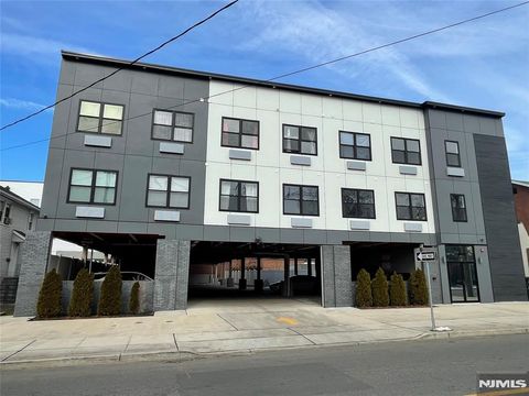 Photo of 51 E Main St #205, Bergenfield, NJ 07621 (MLS # 26002682)