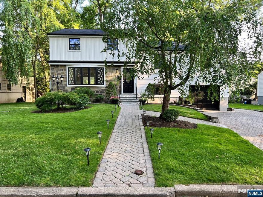 This lovely split-level home is truly one of a kind, offering over 2,300 sq ft of living space in a desirable Englewood neighborhood. Features include an updated kitchen, five spacious bedrooms, hardwood floors throughout, a raised deck, and a large paved patio ideal for privacy and entertaining. Multiple parking spaces add convenience. Conveniently located near shopping, transportation, schools, and houses of worship.