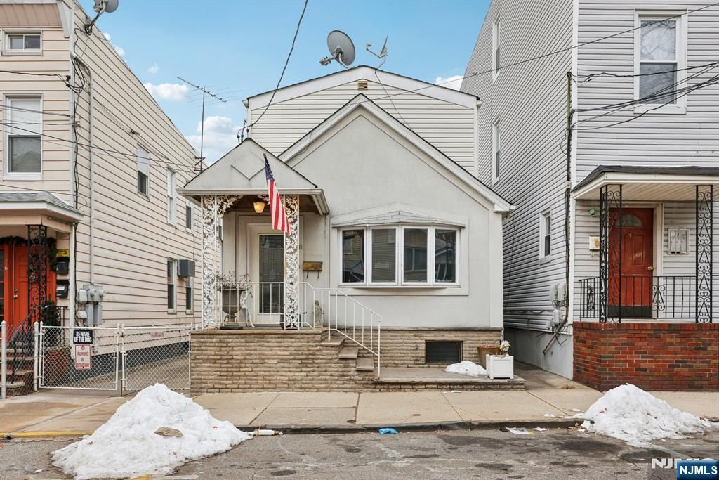 Photo of 18 Patterson Street, Harrison, NJ 07029 (MLS # 25044101)