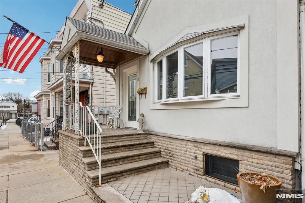 Photo of 18 Patterson Street, Harrison, NJ 07029 (MLS # 25044101)