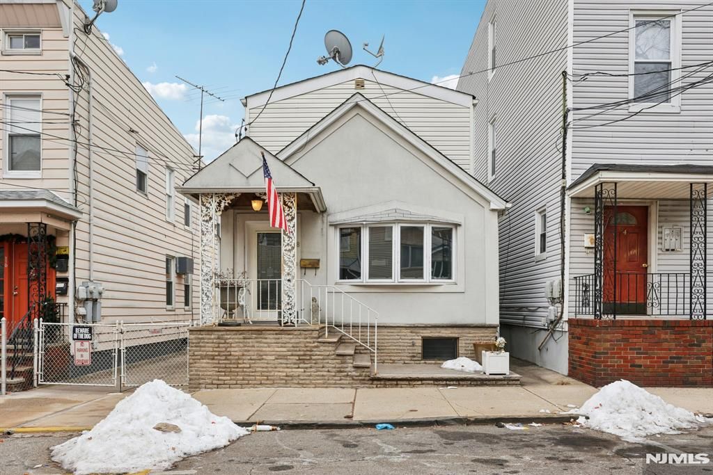 Photo of 18 Patterson Street, Harrison, NJ 07029 (MLS # 25044101)