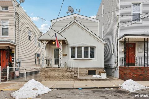 Photo of 18 Patterson Street, Harrison, NJ 07029 (MLS # 25044101)