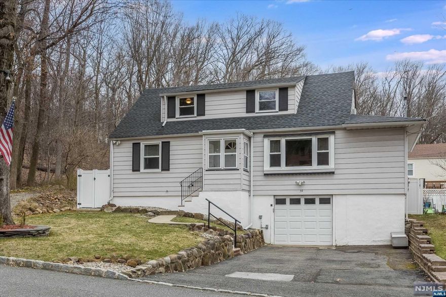 4 BR cape cod in a PRIME location! Nestled at the top of a dead-end street surrounded by nature, this home offers serenity and peace at the end of a long day! Step inside and find a 4BR, 2 full bath home featuring an open floor plan! Love the updated kitchen with granite countertops, an abundance of counter space and stainless-steel appliances! Enjoy a spacious living room and formal dining room ideal for entertaining! The 3 season room off the kitchen leads to a beautiful patio and private backyard completely fenced in. Upstairs you will find 2 generous bedrooms, plenty of closet space and fully updated bathroom. Recent upgrades (2015) include new central air, hot water heater, roof, and a freshly painted interior. Just moments away from local places of worship, this home has the perfect location! And to boot, it's situated with easy access to Turtle Back Zoo, local shopping, delicious dining, Essex County Golf and Parks, and Route 280!