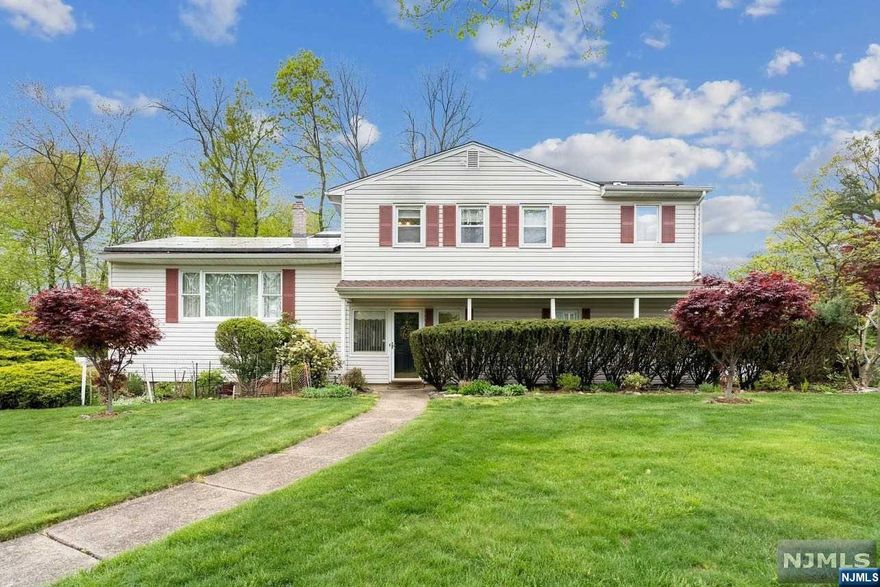 Sinan Akar 201.965.0843 Welcome Home! Fantastic location, updated home, and stunning lot. Large rooms, hardwood floors, recently refurbished bathrooms and kitchen, and a family area that is the center of the home. Situated in a great area close to all the wonderful town of Wayne has to offer.