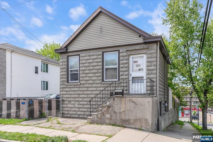 True 2 family home with tons of potential. Great investment property with separate utilities and a large lot. Significant potential for the right buyer. Unit 1 located on the 1st floor has 3BRs, 1 full BA, kitchen, dining area, living room & laundry area. Unit 2 located on the 2nd floor has 1 BR, 1 full bath, kitchen, dining area and a living room. Close to shopping, restaurants, highways and NJ transit. This property is being sold "AS IS".
