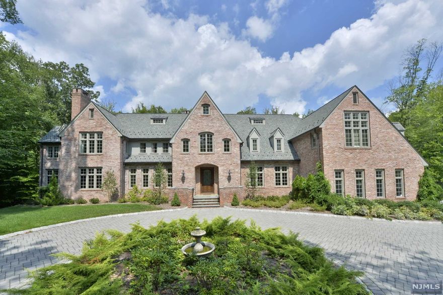 This custom built all brick Colonial Manor offering over 8400 sqft. (on the 1st & 2nd floor) was completed by the original owner/builder in 2010. A new addition, new primary bath, new 1st floor bath & powder room, updates in the lower level, & enlarged pool patio are just some of the features & amenities in this gracious, stately residence. There are 2 potential office/library areas for working remotely. A 4-car garage with space for lifts, 5 fireplaces, inground heated pool, & complete privacy on this sought after cul de sac location.