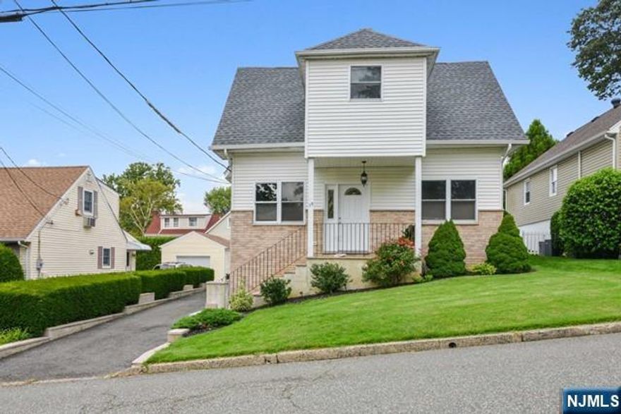 Recently updated two level 2 bedroom 2 bath apartment for rent in Hasbrouck Heights. The first floor includes a designer kitchen with commercial stainless-steel appliances, granite counters, hardwood floors, 2 bedrooms, and 1 bath. The lower level is finished with family room, summer kitchen, full bath, and additional finished room perfect for home office, gym, or storage. It is commuter friendly with a NYC bus at the end of the street and close distance to Wesmont Train Station. Laundry is shared in the basement. Also, there is a detached 2 car garage with 8 ft garage door height to fit your larger vehicles and room for parking in the driveway. The covered deck is perfect for relaxing. Beautiful sunset views make this a must see! Tenant is responsible for electric and gas (separate utilities). Baseboard gas heat and wall AC. 1st month rent and 1.5 month security due at signing. NO PETS.