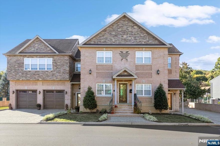 Quality custom-built (2020) 2-family side-by-side-style showcasing exceptional craftsmanship & thoughtful design. Exterior blends brick & stone accents w/ two paver driveways. Perfect for an owner-occupant or investor, this home was built for the current owner with high-end finishes. Inside, youâ€™ll find 4 BR's and 4 baths. Modern amenities expected in a newer build: wide-plank hardwood, multi-zone heat/air, heated garage, moldings, elegant wrought-iron railings, & designer bath tilework. The main unit offers 3 BR's (two en-suites) & 3 baths. Primary suite includes dual custom closets & a spa-inspired bath w/jetted tub, handheld & rainfall showerheads. The open floor plan includes a spacious LR, formal DR, & a beautifully designed kitchen w/ two-tone cabinetry, leaded glass accents, granite countertops, Samsung SS appliances, built-in hood & center island. A 1st floor BR & full bath complete this level . Storage is available in unfinished basement as well as a floored, lighted attic. The 2nd apartment w/a private entrance is located on the 2nd floor. This unit is pristine, updated and rented for $1,750 a month. It offers a BR, bath, a large LR, generous closet with built-ins, & eat-in kitchen. Find storage in front entry & two parking spots in private driveway. Enjoy the small-town charm & natural beauty of Bloomingdale, surrounded by scenic trails, lakes, & parks. Town offers recreation, convenience, and easy access to shops, restaurants, & major highways .