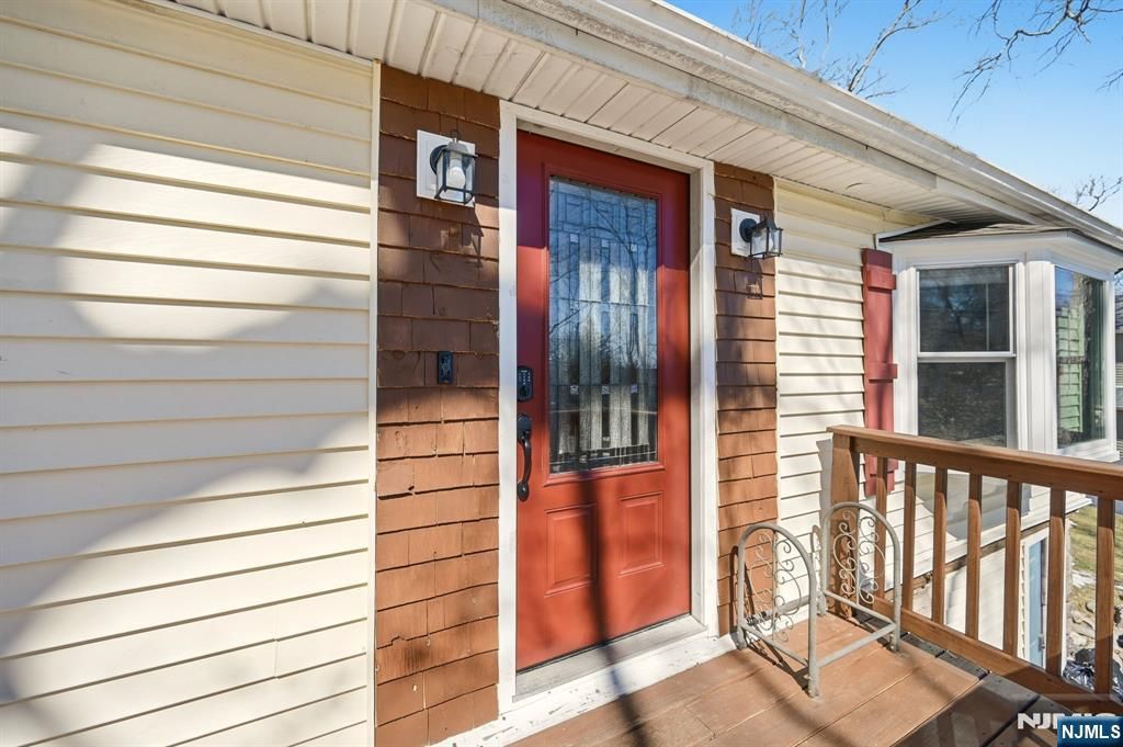 Photo of 42 Woodside Drive, West Milford, NJ 07480 (MLS # 26007774)