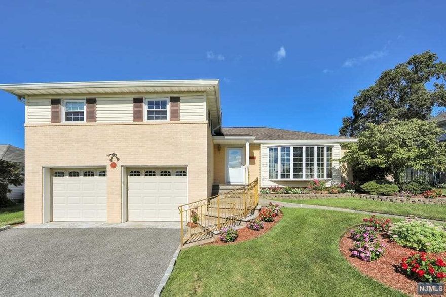 Spacious Split level home located in sought after Montclair Hts section. Curb Appeal invites you in. 2 Story entrance foyer welcomes your guests. Bright LRG LRm w oversized window allows abundance of natural light is open to DRm perfect for entertaining. EIK has Granite Ctrs & Breakfast Bar for easy dining, SS Appls & pantry w pullout draws. 2nd level offers Renov Main FulBA, 2 Full Bdrms & MstrBdrm w private FulBA/2 WICs. Grnd level offers cozy FamRm to relax at end of day, 1/2 BA & convenient laundry rm. Lower level has addt'l living space & large storage rm. 2 Car Garg. Escape to your private yrd & enjoy in-grnd pool, patio & gas line BBQ. Sprinkler Syst for easy lawn care; Alarm Syst for peace of mind; 200 amp elec; some Anderson windows; new AC condenser, newer gutters and more! A MUST SEE!