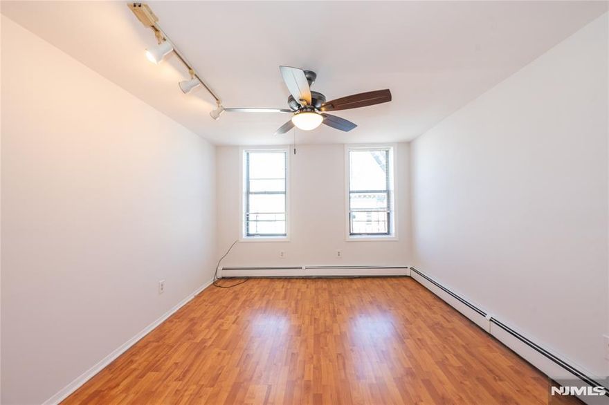 Discover a bright and spacious 2-bedroom, 1-bath condo in the heart of Jersey City Heights, offering the perfect mix of traditional character and modern comfort. Set in a classic 1900 brick building, this 818 sq ft home welcomes you with new high wood cabinets, breakfast tables, quartz countertops and backsplash, and a layout that feels open, functional, and easy to live in. Service Pets are allowed. The updated kitchen features stainless steel appliances, a dishwasher, and ample storageâ€”ideal for cooking at home or hosting guests. The renovated bath adds a clean, modern touch, while both bedrooms offer generous space for sleeping, working, or creating a cozy retreat. With laundry in the building, basement storage, and secure intercom entry, everyday living stays simple and convenient. Just steps from Central Avenueâ€™s vibrant shops, cafés, and dining, and moments from Pershing Field Park, Reservoir #3, and Leonard Gordon Park, this location places the best of the Heights right at your doorstep. Commuters will appreciate the nearby NY and JSQ bus stops. Also, it is within walking distance of Journal Square.