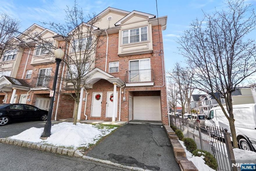 Welcome to 126 Amherst Street, a meticulously maintained end-unit townhome in East Orange offering a flexible and well-designed layout across three levels. The ground floor features a garage and a spacious family room, perfect for entertaining or relaxing. The first floor offers a bright living room/dining room combo, a full bath, and a third bedroom. The second floor includes two generously sized bedrooms, a full bath, an office/loft area, and a master bedroom with a walk-in closet. The home features wood flooring throughout the main living areas and staircase, central air, in-home laundry, and a private lower-level entertaining space. Conveniently located within half a mile of NJ Transit's East Orange Train Station and close to major highways, shopping, and everyday amenities. This is a short sale and is being sold strictly as-is. Buyer is responsible for Smoke/CO certification.