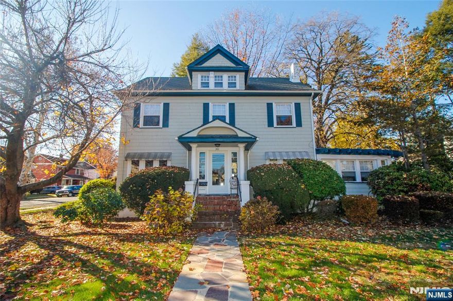 Welcome Home! Nestled on a double lot, this four story, 6 bedroom colonial offers plenty of space for family and friends to enjoy for generations. The first floor boasts a stunning living room with fireplace, traditional dining room, eat-in kitchen, two bedroom, full bath and a den. Four generously sized bedrooms and full bath await you on the second floor. The walk up attic offers potential for two additional bedrooms, a full bath and storage. The basement features a game room, wet bar, half bath, laundry and a wine cellar! Don't miss this incredible opportunity to own a piece of history while enjoying this gorgeous family home. Newer windows on first and second floors.