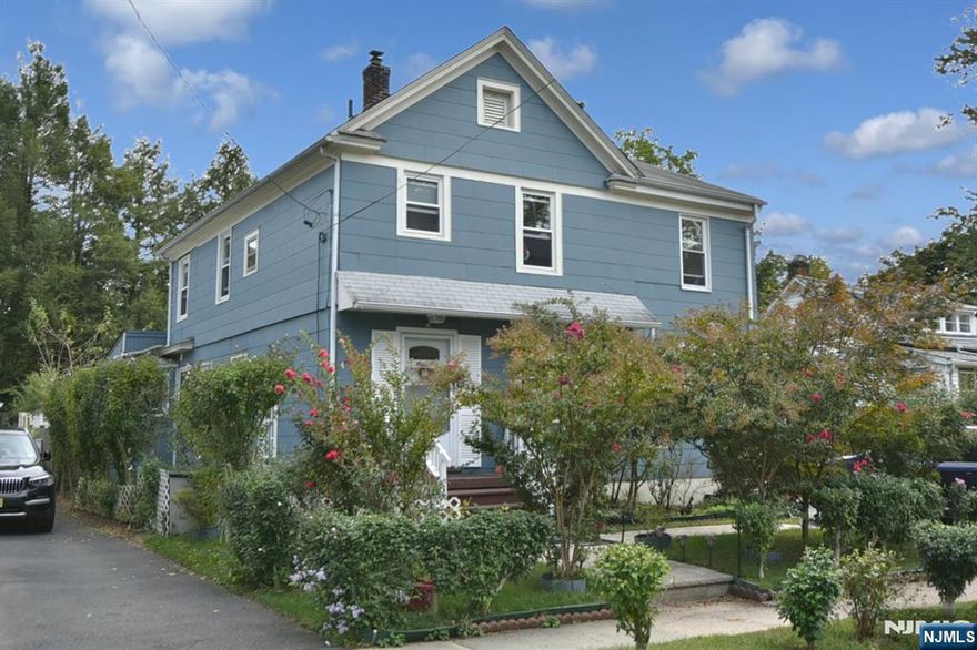 Classic 1930's Colonial in Ridgewood. Welcome to this timeless home, filled with charm and character, located in one of Ridgewood's most desirable neighborhoods. With its classic curb appeal, this home blends historic style with everyday comfort. Inside you will find light-filled rooms, hardwood floors as-in, and easy flow throughout the home. The spacious living room sets the stage for cozy evenings, while the formal dining room is perfect for gatherings. An updated kitchen offers easy flow into the massive family room. Upstairs, generously sized bedrooms and a well-appointed bathroom provide comfort and flexibilty.