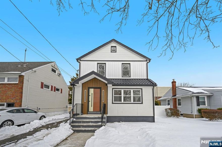 Welcome to this beautiful Colonial home located in the desirable town of Hasbrouck Heights, NJ this spacious residence offers 4 generously sized bedrooms and 3 full bathrooms, blending classic charm with modern comfort. The inviting living room features a cozy fireplace, perfect for relaxing or entertaining, and flows seamlessly into a formal dining room ideal for gatherings. The large eat-in kitchen boasts a center island and ample cabinetry, making it a true heart of the home. A fully finished basement provides additional living space for a family room, home office, or recreation area. Additional highlights include a one-car garage and a primary bedroom with stunning NYC skyline views. Conveniently located close to top-rated schools, shopping, dining, and public transportation, this home offers both comfort and an unbeatable location.