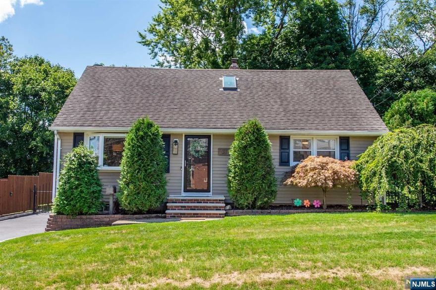 Your search is over!!! Welcome to this immaculate, classy home with 3 bedrooms, 2 full baths in a CUL-DE-SAC. It has beautiful hardwood floors through-out the house, newer kitchen, updated bathrooms, central air and heat. First floor has an open concept - living room, kitchen and elegant dining room with 2 bedrooms and an updated full bath. The 2nd floor features the expansive primary bedroom with updated full bath and sizable walk-in closet. Resort-like, huge backyard with above ground pool, newer deck, fire pit and pergola for entertainment. Newly paved long driveway, close to major highways, restaurants, schools and NJ Transit Bus Terminal (park and ride to NYC).