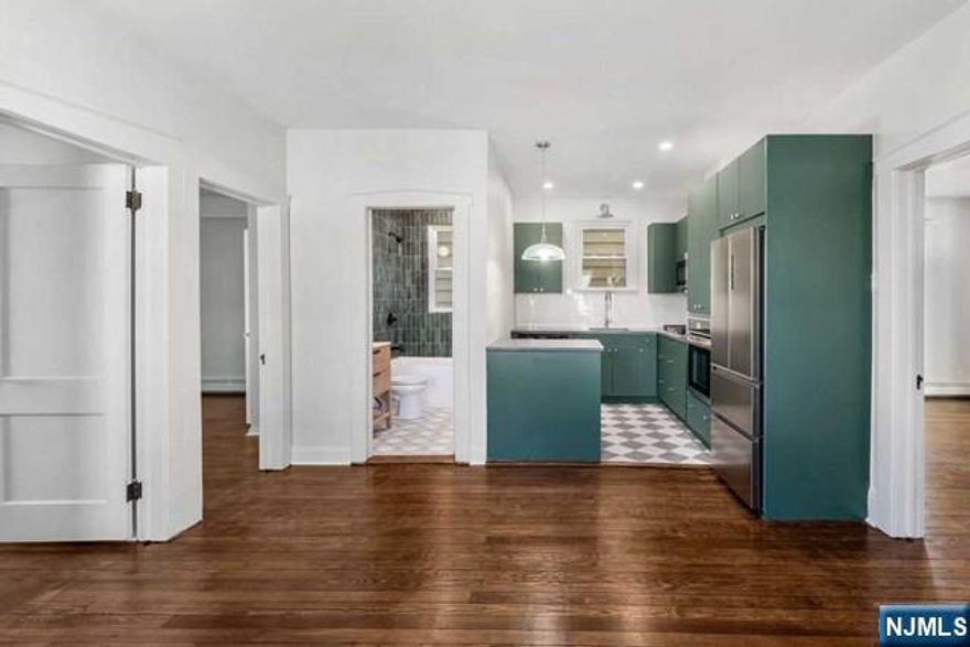 You have arrived at 23 Tuttle, a recently renovated 2 bedroom home nestled in the heart shaped borough of Wallington. Your arrival awaits with an abundance of natural light streaming in through an array of windows. The oversized living room is highlighted by a bright sun room that can be ideal as a work from home nook. The dine-in kitchen is a showstopper. It features matte porcelain tiles to match the beautiful green soft close cabinetry & soapstone mist quartz countertops which extend onto a sleek island and make meal prepping a breeze. Unwind in the bathroom's contemporary elegance surrounded by stunning green subway tiles. With laundry in the basement, chores become a convenient part of your routine. 23 Tuttle features lease add ons such as driveway parking included. Direct access to major highways & NYC bus & train routes. The Meadowlands Complex which is home to the American Dream Mall & Metlife Stadium is just a short distance away!