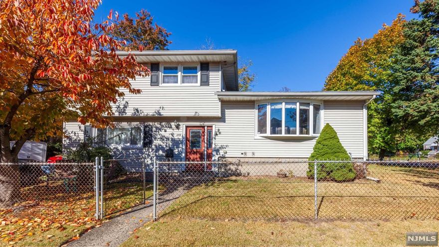 Welcome To This Great House! This Split Level home is in move-in condition. Wonderfully maintained and updated, 4 Bedrooms, 1.5 Bath, New Kitchen with Granite counter top. Stainless Steel Appliances and Ceramic tile floor. Inviting Foyer, Dining room & Living Room with Cathedral Ceiling, Ground Level Den/Office or 4th bedroom with separate out side entrance. Family Room, Basement has Laundry room, work shop, utilities and lot of storage. Hard wood floors. Close to Major Highways and Transportation For An Easy Commute. Seller is Motivated To Sell!!