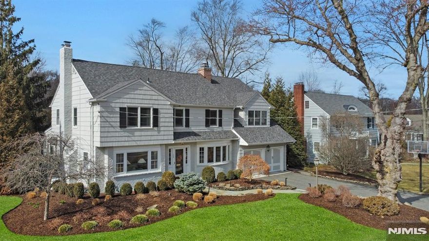 Discover this stunning home at 700 Waverly Road in Ridgewood, NJ, offering 4 bedrooms, 3.5 baths, and exceptional features. The custom Ulrich kitchen boasts granite countertops, a Sub-Zero refrigerator, Bosch dishwasher, Thermador gas cooktop, and Sharp microwave. Enjoy multiple fireplaces in the office, family room, and formal living room, along with custom bookshelves, wet bar, and French-laid travertine tile. The primary suite includes a gas fireplace, walk-in closet, steam shower, and covered balcony. Additional highlights include a finished basement, walk-up attic, updated HVAC, a heated gunite pool/spa, and a two-car garage. Situated just three blocks from Willard School. Contact Jeff Feagles at 201-803-9624 for more information.