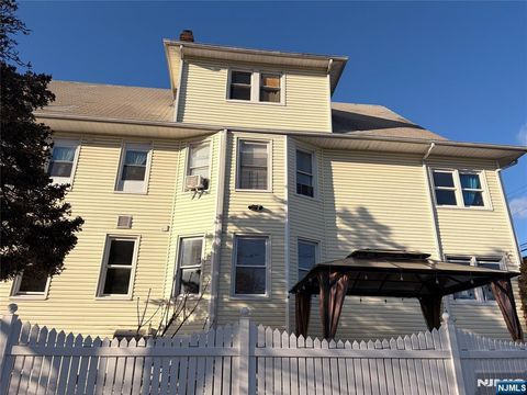 Photo of 35 Marsellus Pl #1, Garfield, NJ 07026 (MLS # 26000396)