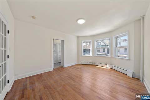 Photo of 8 Cooper Pl #2nd Fl, Weehawken, NJ 07086 (MLS # 26021137)