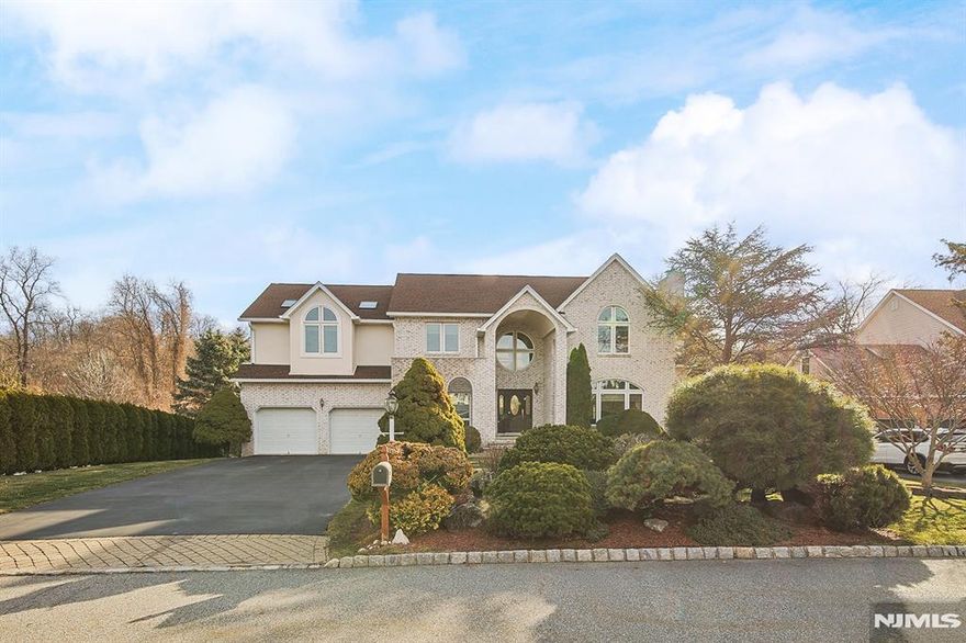 Originally built for builderâ€™s home, this craftsmanship house shows incredible qualities & details. From entrance façade, you feel values of style, architectural details & artisanship. ML is designed for both entertaining & comfortable daily living, defined by high-end finishes. EF features classic marble flooring. LR & separate DR are dedicated spaces for special events. Expansive FR/LR is anchored by artisan-crafted fpl & bathed in natural light. Sun-drenched kitchen features SS appliances, center island, & double-height windows & skylights that keep the area bright all day. BR located on ML provides convenience & comfort to extended-family. PR, Laundry Room, & 2-car garage also offer convenience to living on ML. Craftsmanship continues upstairs, where high ceilings and thoughtful layouts create a sense of peaceful seclusion. Primary suite offers a sanctuary featuring cathedral ceiling, WIC & spa-like bath. Jr. suite makes perfect for guests/ extended family. Additional 2 BRs offers large closets. Hallway Bathroom features double vanities and classy tiling. Hallway overlooking 1st floor kitchen & EF enhances the homeâ€™s style with chandelier & craftsmanship windows. Homeâ€™s footprint extends into massive, unfinished lower level featuring 9' ceilings & convenient walkout to backyard, potential for home cinema, gym, or guest suite. Set upon a lush, 20,000-square-foot private sanctuary, the home is framed by the soothing sounds of a winding creek and picturesque pond