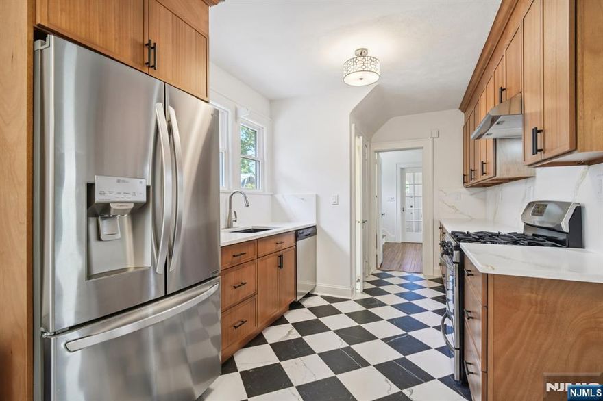 Experience refined living in this stately brick Tudor nestled in one of Englewoodâ€™s most sought-after neighborhoods. Showcasing true pride of ownership, the home features four generously sized bedrooms, two full baths, a beautifully renovated kitchen, and gleaming hardwood floors throughout. The partially finished basement adds versatility, while the private backyard offers a serene retreat. One car detached garage with a long driveway. Just moments from Englewoodâ€™s vibrant town center, youâ€™ll enjoy premier shopping, fine dining, cultural attractions, parks, houses of worship, and seamless transportation access. A perfect balance of charm and convenience awaits. NTN credit report and interview required. Sorry, no pets.