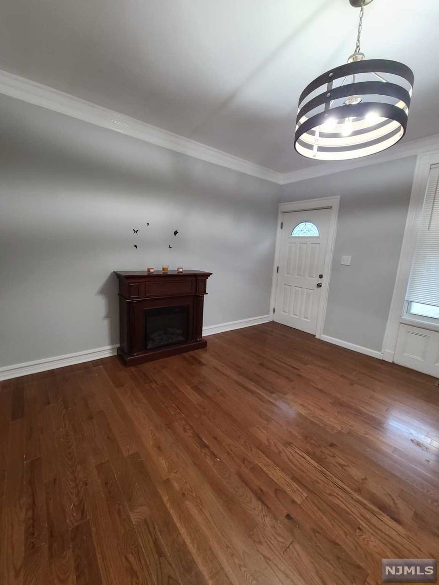 Cozy 1/2 Duplex, just renovated! Living room, formal dining room, kitchen with new SS appliances. Second level features 2 bedrooms and an additional room for office space. Full finished basement space with laundry hook up and low taxes are a real Bonus!! Located close to major highways. The Perfect opportunity for a new home owner.