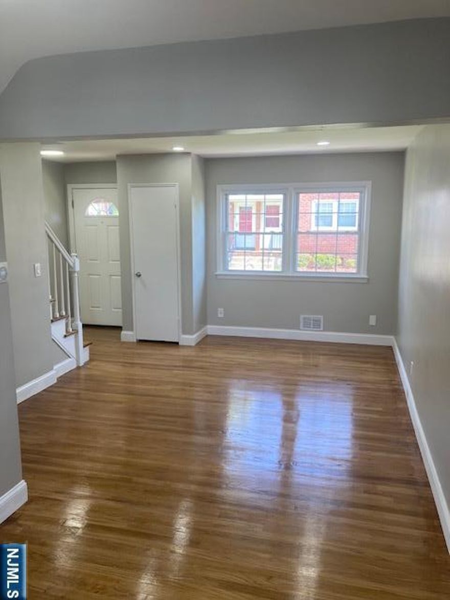 Enjoy 3 floors of living space in this beautifully renovated 2 bedroom 1 bath duplex including a basement w/ high ceilings. Offering conveniences like your very own washer & dryer and a designated parking space right outside your kitchen door. Freshly painted throughout with a brand new kitchen, updated bathroom, and refinished hardwood floors. Spotless, modern, and available for immediate possession. NYC bus just outside the complex and located near schools, parks, and shopping. All applicants must provide a credit report, proof of income, and a completed application subject to review by the Landlord. Agent is related to Landlord